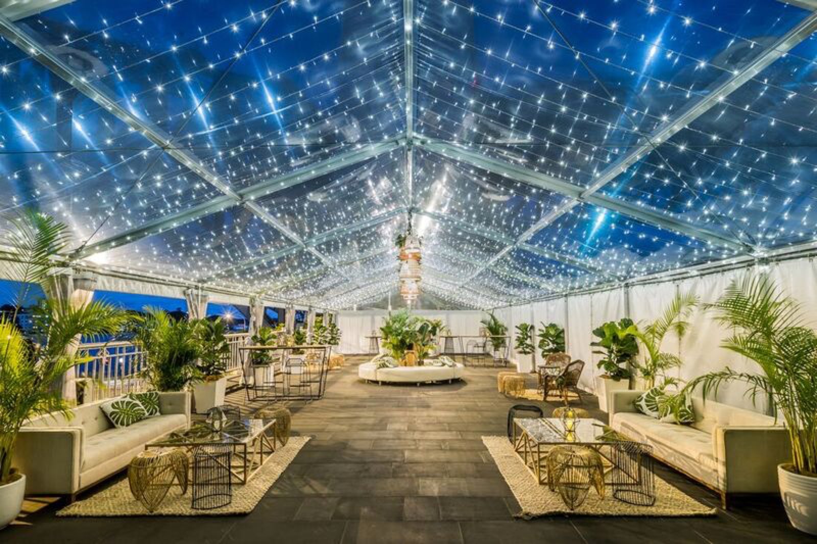 The Bridge Marquee at night under a canopy of fairy lights